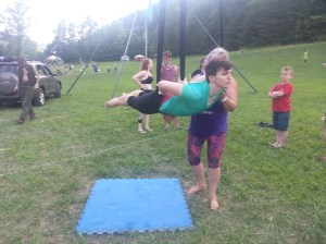 Cindy led a great aerial hammock class.  Here, she's showing me how to get into a forward balance (once you get to this point you take your hands off the hammock; I don't have a picture of that, though).  I didn't get pictures of the coolest parts, since Denis was in the other group on one of the other rigs at the same time.